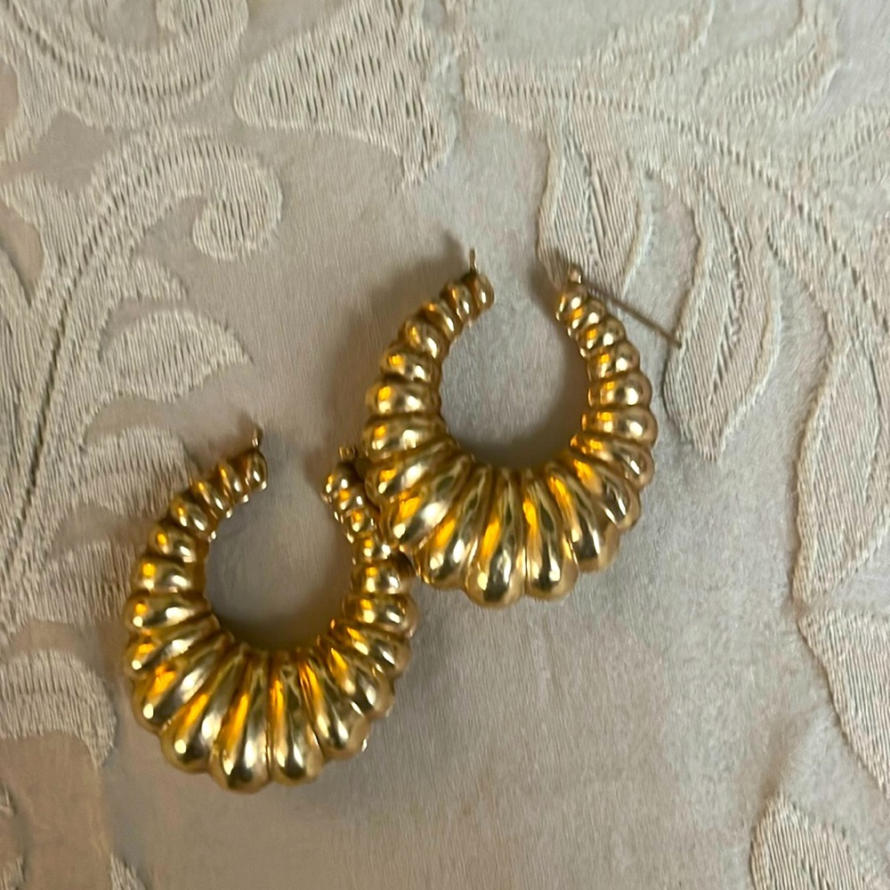 14k large notched hoop earrings.